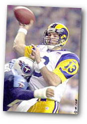 Kurt Warner drops back to make a pass
